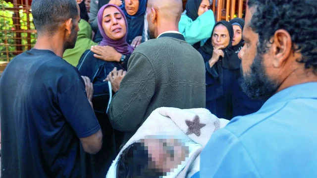 annesinin kucaginda kursunladilar HPzAPhqm